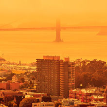 A view across a city in an orange hue