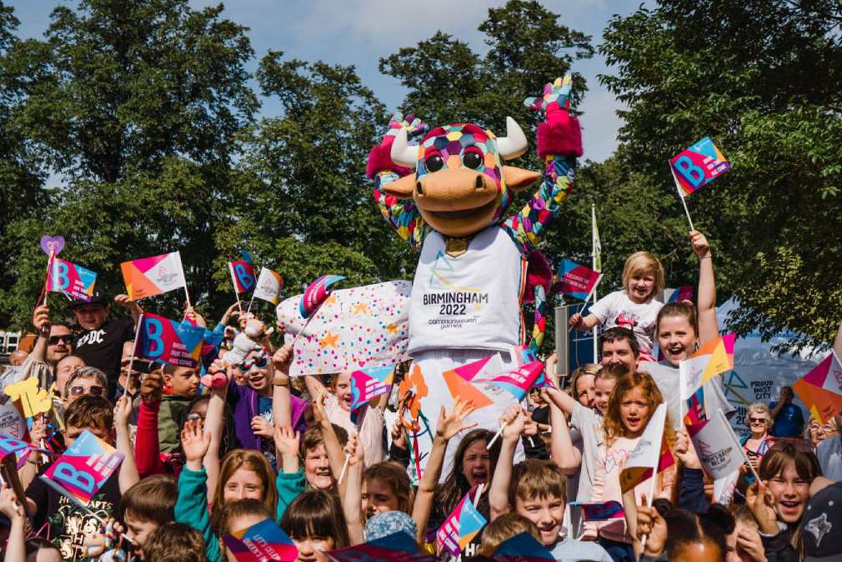 A group of people holding flags.