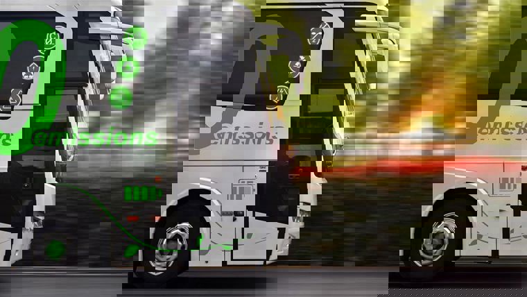 An electric bus driving along a road