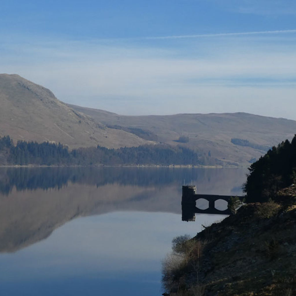 A lake surrounded by mountains.