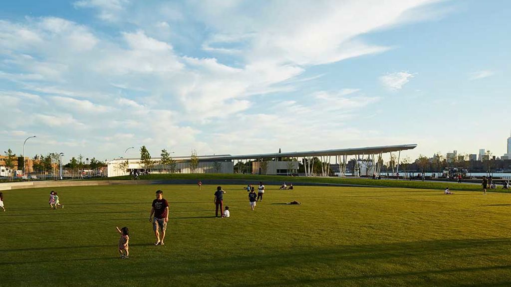 Family enjoying green space at Hunters Point south