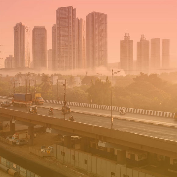 A city skyline with a freeway.
