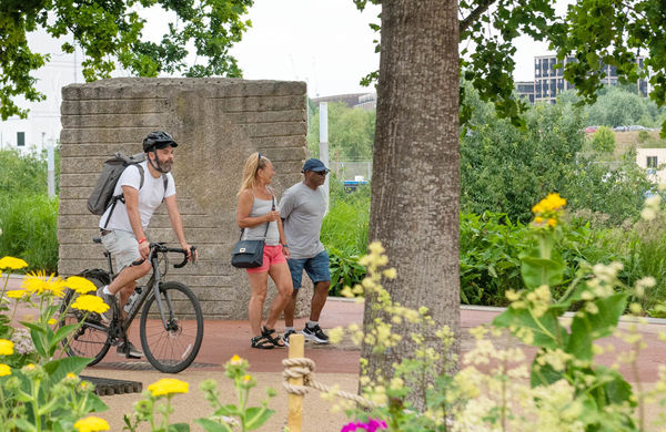 People walking and cycling in a city