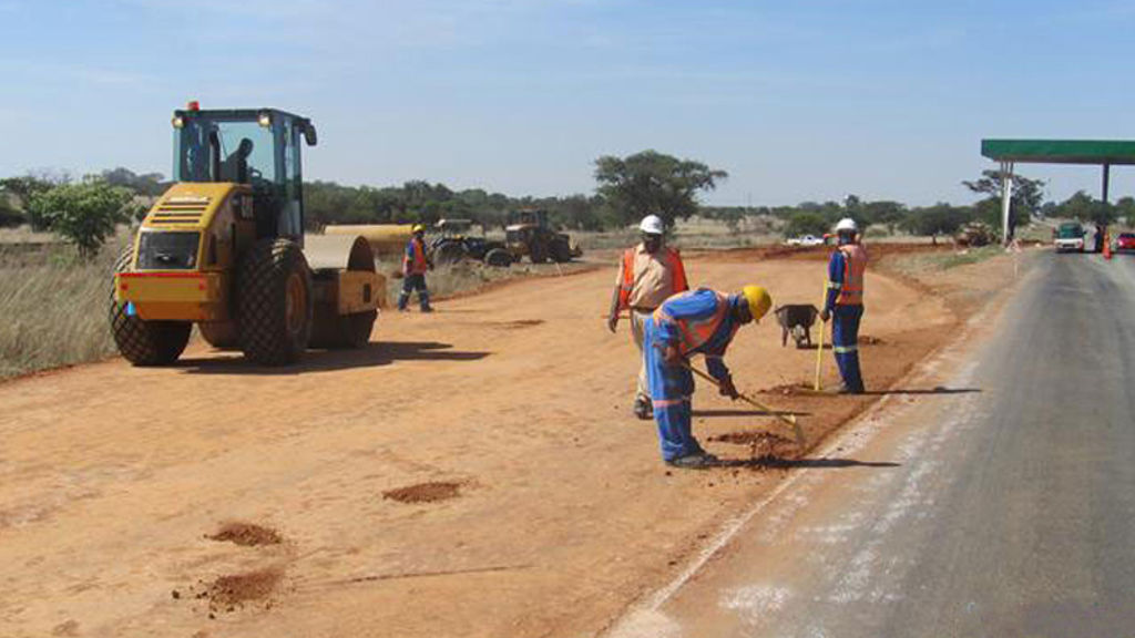 A group of men working on a road.