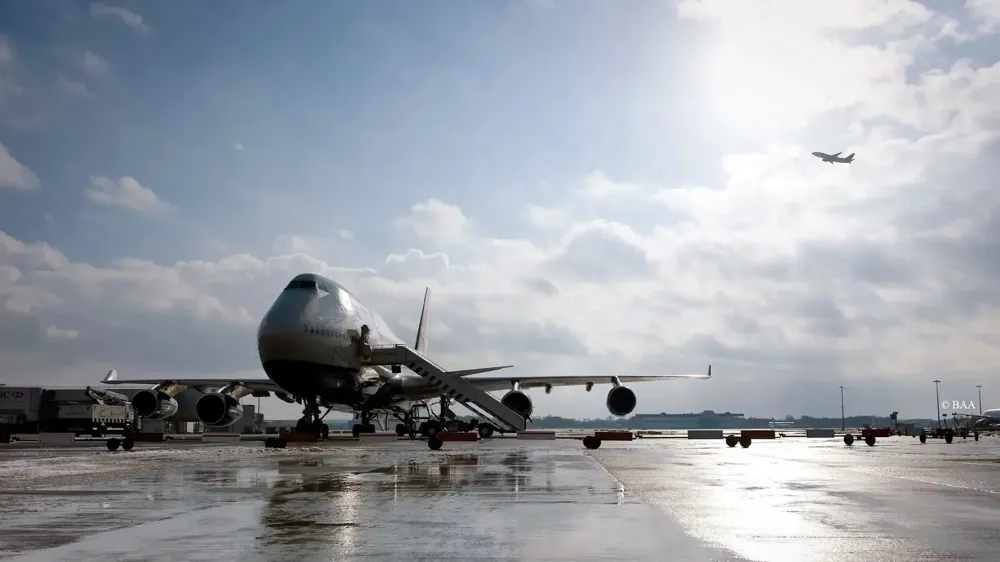 A large airplane on the runway.