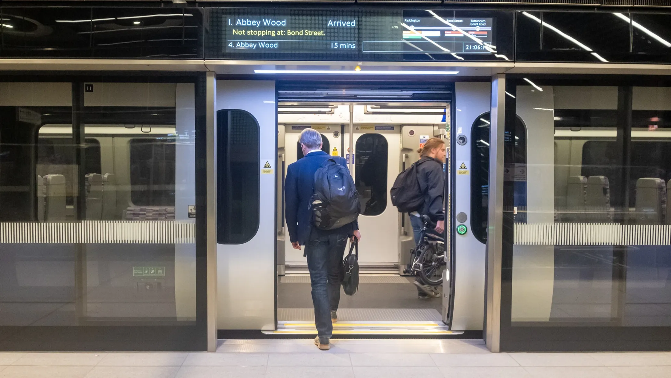 People boarding an east bound Elizabeth train