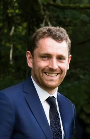 A man in a suit and tie.